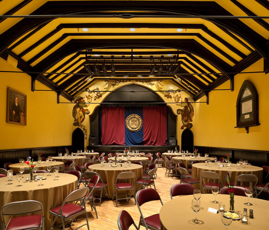 a room with tables and chairs.